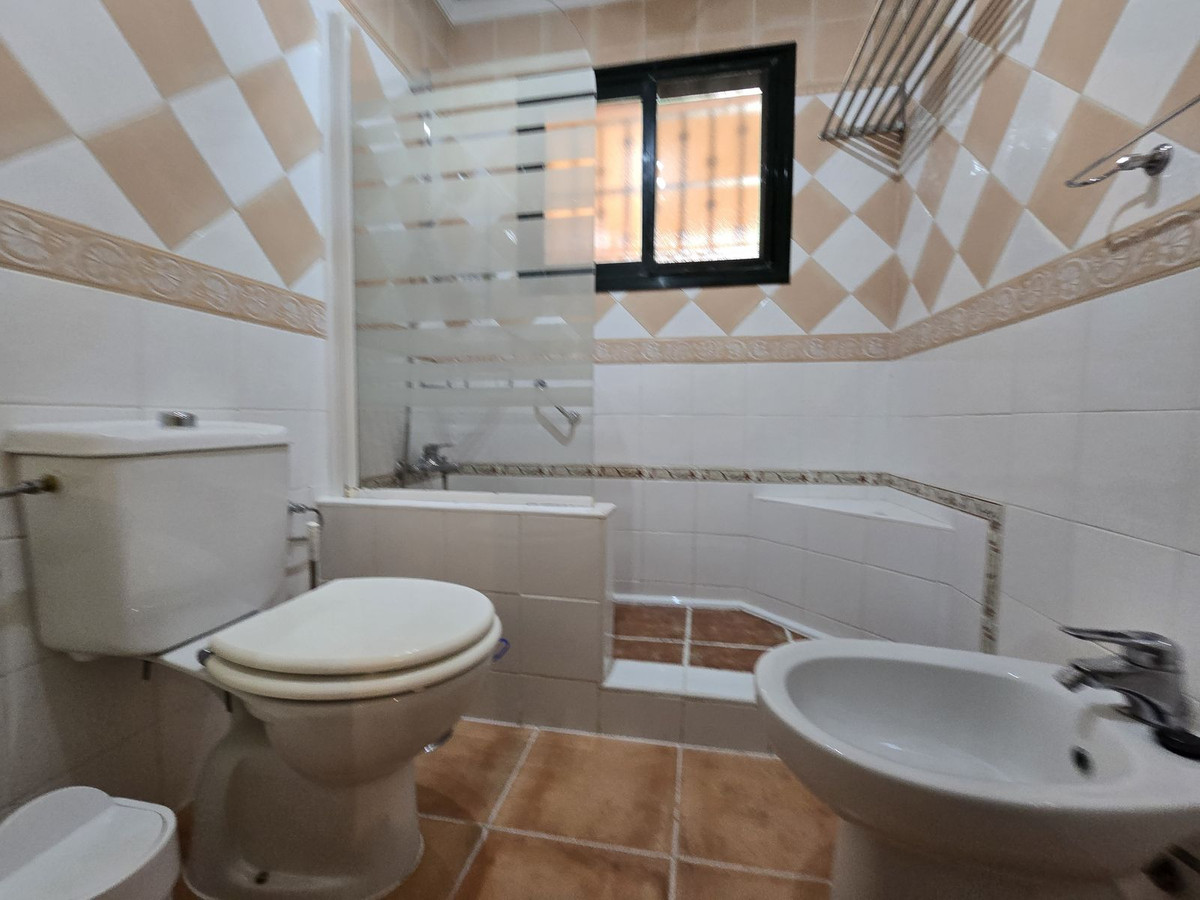 Begane grond appartement in Elviria-14