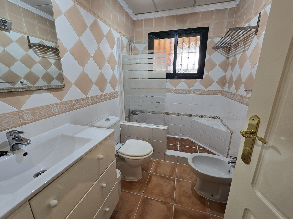 Begane grond appartement in Elviria-18