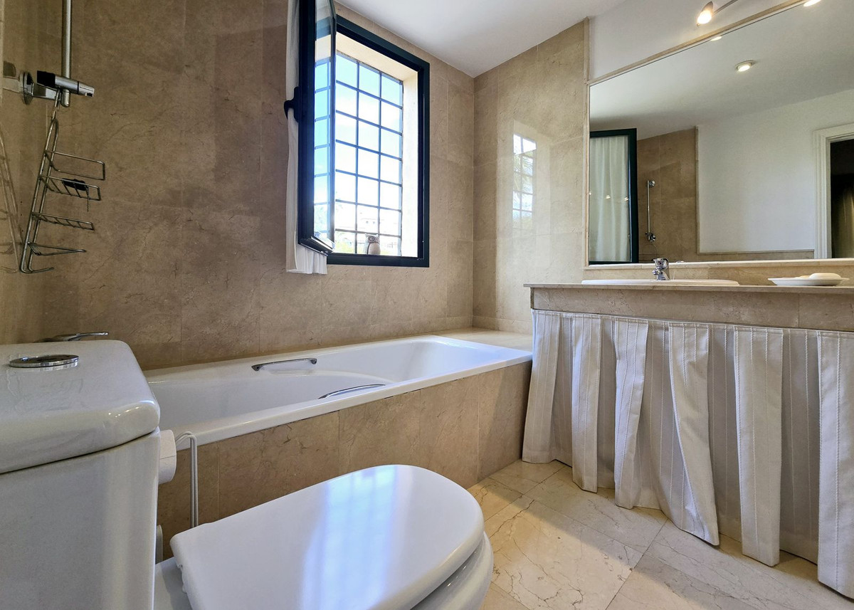 Begane grond appartement in Elviria-31