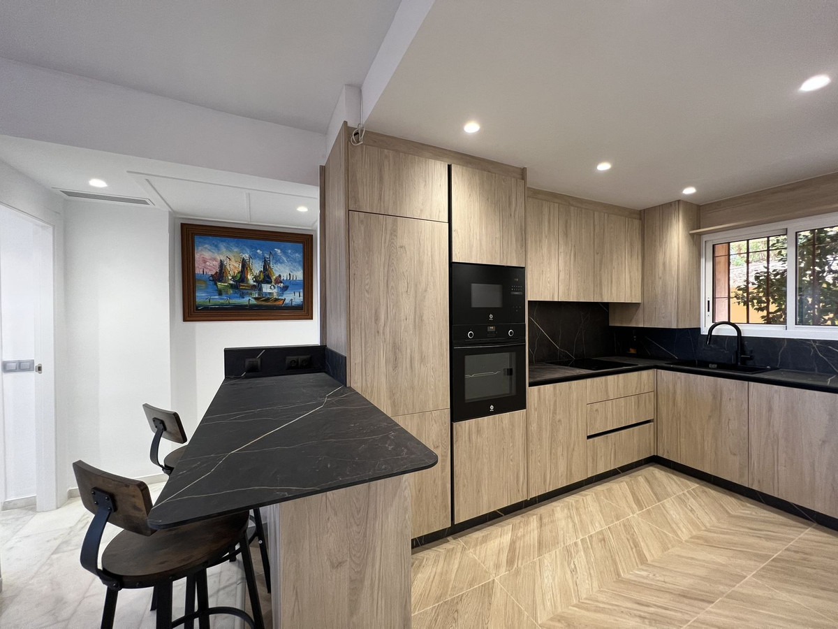 Begane grond appartement in Elviria-12